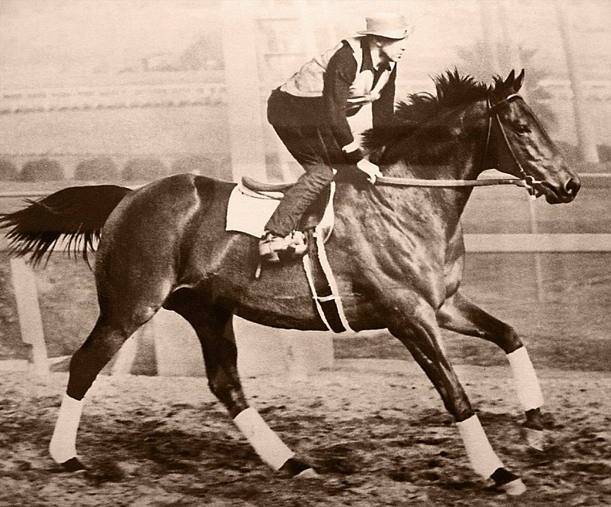 Photo of George Woolf on Seabiscuit